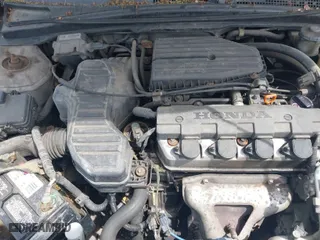 2005 Honda Civic LX with VIN 1HGEM21555L070407, listed as a IAAI auction lot 41997054 with 194,993 mi miles. Bid and sale history available at carsss.com. Image 10.