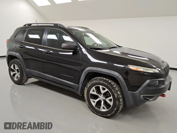 2015 Jeep Cherokee Trailhawk with VIN 1C4PJMBSXFW746138, listed as a Copart auction lot 49877985 with 86,820 mi miles and Clean Title. Bid and sale history available at carsss.com. Image 4.