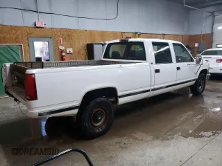 1997 Chevrolet Silverado 3500 z VIN 1GCGC33R9VF031799, wystawiony jako Copart lot #69377024 z przebiegiem 185 024 mil mil oraz Tytuł czysty. Historia ofert i sprzedaży dostępna na DreamBid. Obrazek 3.