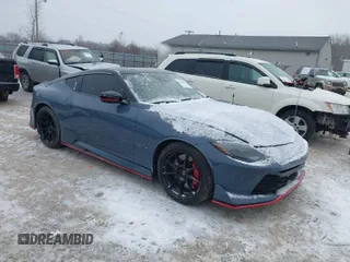 2024 Nissan Z Nismo with VIN JN1BZ4CH6RM360311, listed as a IAAI auction lot 41596881 with 8,916 mi miles and . Bid and sale history available at DreamBid. Image 1.