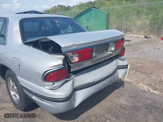 1998 Buick LeSabre Custom with VIN 1G4HP52K1WH412332, listed as a IAAI auction lot 41923320 with 201,306 mi miles. Bid and sale history available at carsss.com. Image 6.