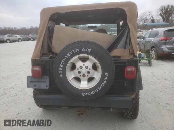 2002 Jeep Wrangler Sahara with VIN 1J4FA59S42P720513, listed as a Copart auction lot 47054805 with 190,922 mi miles and Salvage title. Bid and sale history available at DreamBid. Image 6.