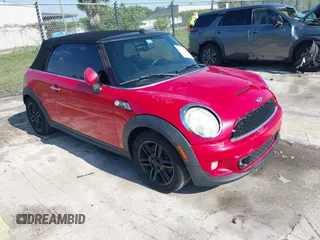 2014 MINI Convertible S z VIN WMWZP3C50ET298497, wystawiony jako IAAI lot #42345812 z przebiegiem 119 921 mil mil oraz . Historia ofert i sprzedaży dostępna na DreamBid. Obrazek 1.