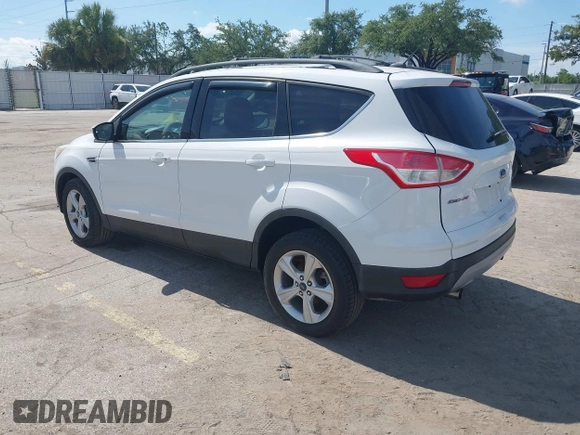 2013 Ford Escape SE with VIN 1FMCU0GX5DUA85464, listed as a IAAI auction lot 42701315 with 158,093 mi miles and . Bid and sale history available at DreamBid. Image 3.