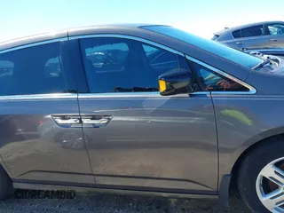2012 Honda Odyssey Touring with VIN 5FNRL5H91CB057344, listed as a IAAI auction lot 41835272 with 158,854 mi miles. Bid and sale history available at carsss.com. Image 13.