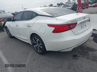 2016 Nissan Maxima SL with VIN 1N4AA6AP3GC448957, listed as a IAAI auction lot 41734717 with 128,687 mi miles and . Bid and sale history available at DreamBid. Image 3.