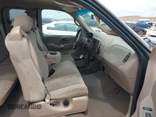 2001 Ford F-150 XL with VIN 1FTZX07271KB88709, listed as a IAAI auction lot 42599181 with 153,985 mi miles and . Bid and sale history available at DreamBid. Image 5.
