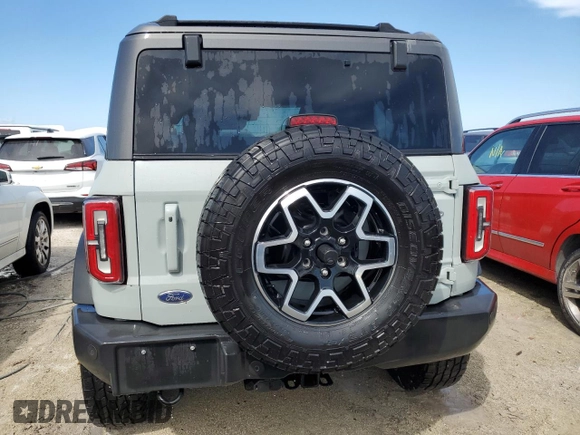 2021 Ford Bronco z VIN 1FMDE5CP4MLA65927, wystawiony jako Copart lot #74809974 z przebiegiem 41 296 mil mil oraz Nie do naprawy • Non repairable. Historia ofert i sprzedaży dostępna na DreamBid. Obrazek 6.