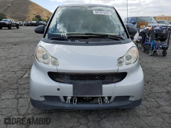 2009 Smart fortwo Pure with VIN WMEEJ31X89K251402, listed as a Copart auction lot 56791545 with 52,636 mi miles and Clean title. Bid and sale history available at DreamBid. Image 5.