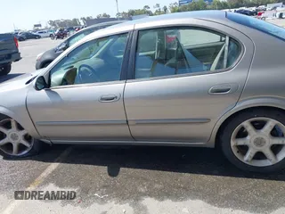 2001 Nissan Maxima GXE with VIN JN1CA31D41T815592, listed as a IAAI auction lot 42465005 with 96,822 mi miles and . Bid and sale history available at DreamBid. Image 14.