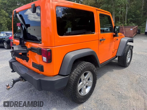 2012 Jeep Wrangler Rubicon with VIN 1C4HJWCG5CL152550, listed as a Copart auction lot 66047195 with 187,458 mi miles and Clean title. Bid and sale history available at DreamBid. Image 4.