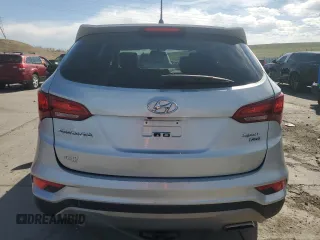2018 Hyundai Santa Fe 2.4L z VIN 5XYZTDLB7JG572441, wystawiony jako Copart lot #52810145 z przebiegiem 106 578 mil mil oraz Szkoda całkowita • Salvage title. Historia ofert i sprzedaży dostępna na DreamBid. Obrazek 6.