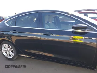 2015 Chrysler 200 Limited with VIN 1C3CCCAB4FN695203, listed as a IAAI auction lot 42105080 with 139,140 mi miles. Bid and sale history available at carsss.com. Image 13.