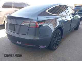 2018 Tesla Model 3 Long Range Battery with VIN 5YJ3E1EA7JF163401, listed as a IAAI auction lot 41829681 with 90,065 mi miles. Bid and sale history available at carsss.com. Image 4.