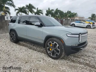 2024 Rivian R1S Adventure with VIN 7PDSGABA1RN031380, listed as a Copart auction lot 73119354 with 6,786 mi miles and Salvage Title. Bid and sale history available at carsss.com. Image 4.