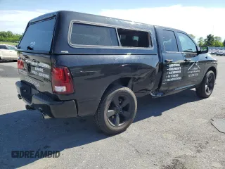 2014 Ram 1500 Express with VIN 1C6RR7FTXES388025, listed as a Copart auction lot 57968005 with 125,232 mi miles and Salvage title. Bid and sale history available at DreamBid. Image 3.