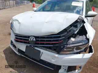2017 Volkswagen Passat S with VIN 1VWAT7A30HC016932, listed as a IAAI auction lot 42611874 with 100,959 mi miles and . Bid and sale history available at DreamBid. Image 6.