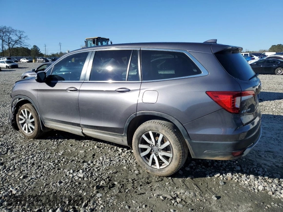 2021 Honda Pilot EX-L with VIN 5FNYF5H57MB027475, listed as a Copart auction lot 42239455 with 66,713 mi miles and Salvage Title. Bid and sale history available at carsss.com. Image 2.