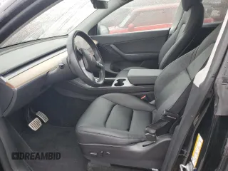 2022 Tesla Model Y Performance z VIN 7SAYGDEF9NF382883, wystawiony jako Copart lot #52028085 z przebiegiem 49 108 mil mil oraz Szkoda całkowita • Salvage title. Historia ofert i sprzedaży dostępna na DreamBid. Obrazek 7.