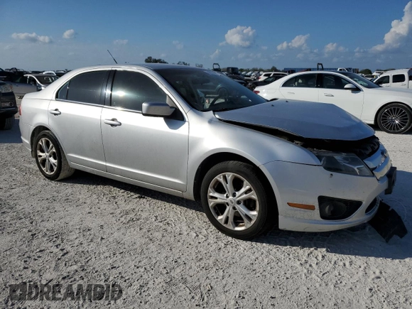 2012 Ford Fusion SE with VIN 3FAHP0HG0CR154640, listed as a Copart auction lot 44767775 with 94,206 mi miles and Salvage Title. Bid and sale history available at DreamBid. Image 4.