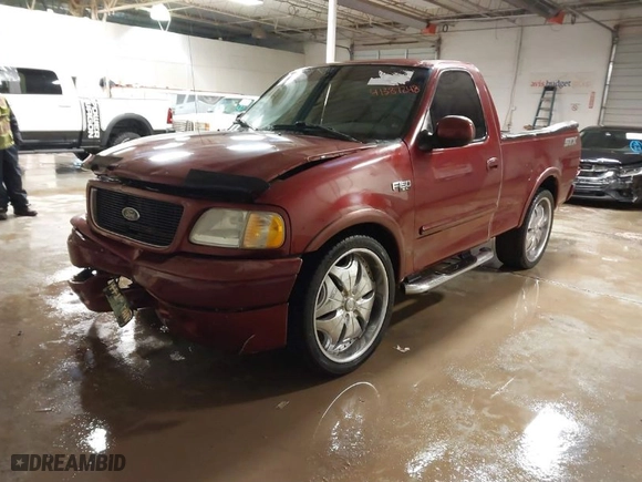 2003 Ford F-150 Heritage XL with VIN 2FTRF17243CA88390, listed as a IAAI auction lot 41387248 with 1 mi miles. Bid and sale history available at carsss.com. Image 2.