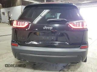 2021 Jeep Cherokee 80th Anniversary with VIN 1C4PJMMN2MD128053, listed as a Copart auction lot 54262175 with 47,454 mi miles and Salvage title. Bid and sale history available at DreamBid. Image 6.