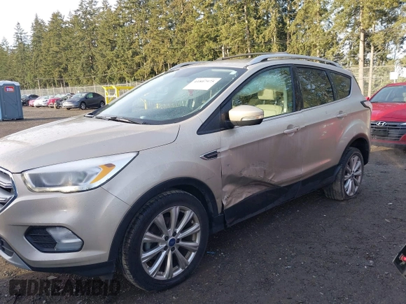 2017 Ford Escape Titanium with VIN 1FMCU0JD0HUB79739, listed as a IAAI auction lot 41807975 with 121,902 mi miles. Bid and sale history available at carsss.com. Image 6.