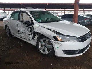 2015 Volkswagen Passat 1.8T SE w/Sunroof & Nav with VIN 1VWBT7A34FC016269, listed as a IAAI auction lot 41754089 with 357,694 mi miles. Bid and sale history available at carsss.com. Image 1.