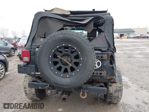 2008 Jeep Wrangler Unlimited X with VIN 1J4GA39138L641138, listed as a IAAI auction lot 41986230 with 215,026 mi miles. Bid and sale history available at carsss.com. Image 17.
