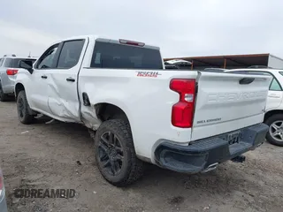 2023 Chevrolet Silverado 1500 LT Trail Boss with VIN 3GCUDFE82PG145067, listed as a IAAI auction lot 41380162 with 34,623 mi miles and . Bid and sale history available at DreamBid. Image 3.