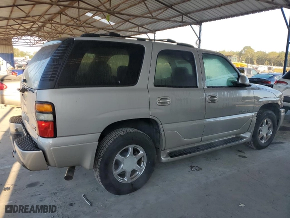 2006 GMC Yukon Denali with VIN 1GKEK63U16J161398, listed as a Copart auction lot 74919984 with 171,796 mi miles and Salvage Title. Bid and sale history available at carsss.com. Image 3.