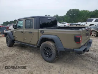 2020 Jeep Gladiator Sport S z VIN 1C6HJTAG6LL160925, wystawiony jako Copart lot #56888555 z przebiegiem 64 017 mil mil oraz Szkoda całkowita • Salvage title. Historia ofert i sprzedaży dostępna na DreamBid. Obrazek 2.