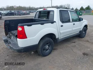 2005 Ford Explorer Sport Trac XLS z VIN 1FMZU77K85UB51935, wystawiony jako IAAI lot #42132767 z przebiegiem 170 057 mil mil oraz . Historia ofert i sprzedaży dostępna na DreamBid. Obrazek 4.