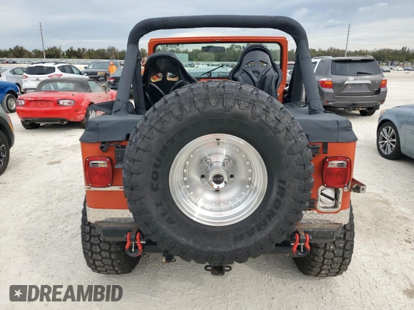 1984 Jeep CJ z VIN 1JCCM87E9ET003890, wystawiony jako Copart lot #78302994 z przebiegiem Nie podano mil oraz Szkoda całkowita • Salvage title. Historia ofert i sprzedaży dostępna na DreamBid. Obrazek 6.