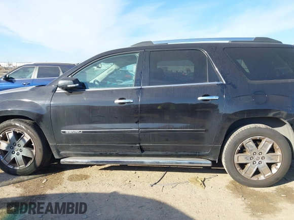 2016 GMC Acadia Denali with VIN 1GKKRTKDXGJ159049, listed as a IAAI auction lot 41334814 with 150,351 mi miles. Bid and sale history available at carsss.com. Image 14.