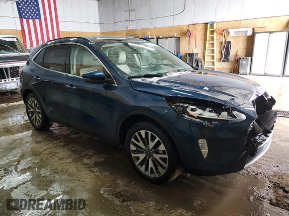 2020 Ford Escape Titanium Hybrid z VIN 1FMCU9DZ0LUA74302, wystawiony jako Copart lot #48614065 z przebiegiem 91 923 mil mil oraz Szkoda całkowita • Salvage title. Historia ofert i sprzedaży dostępna na DreamBid. Obrazek 4.