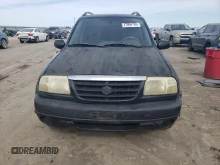 2003 Suzuki Grand Vitara z VIN JS3TE62V834101506, wystawiony jako Copart lot #47094765 z przebiegiem 240 778 mil mil oraz Szkoda całkowita • Salvage title. Historia ofert i sprzedaży dostępna na DreamBid. Obrazek 5.