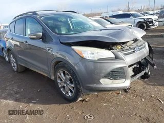 2013 Ford Escape SEL with VIN 1FMCU0HX1DUD51965, listed as a IAAI auction lot 41667262 with 164,493 mi miles. Bid and sale history available at carsss.com. Image 1.