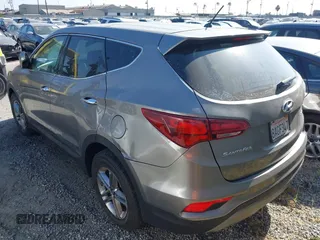 2018 Hyundai Santa Fe 2.4L with VIN 5NMZT3LB8JH076788, listed as a IAAI auction lot 42421969 with 49,689 mi miles and . Bid and sale history available at DreamBid. Image 3.