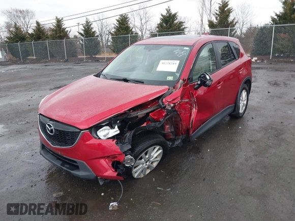 2014 Mazda CX-5 Touring with VIN JM3KE2CY2E0322211, listed as a IAAI auction lot 41721219 with 127,312 mi miles. Bid and sale history available at carsss.com. Image 2.