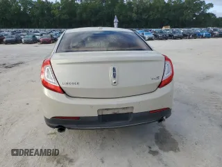 2014 Lincoln MKS with VIN 1LNHL9DKXEG612758, listed as a Copart auction lot 53230065 with 98,863 mi miles and Salvage Title. Bid and sale history available at carsss.com. Image 6.