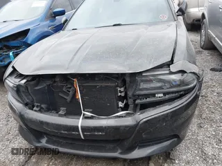 2015 Dodge Charger SE with VIN 2C3CDXBG7FH841469, listed as a IAAI auction lot 42001599 with 103,342 mi miles and . Bid and sale history available at DreamBid. Image 12.