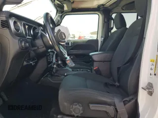 2019 Jeep Wrangler Unlimited Sahara с VIN 1C4HJXEN4KW593522, выставлен на аукционе Copart как лот 57528955 с пробегом 77 382 миль миль и Списание • Salvage title. История ставок и продаж доступна на DreamBid. Изображение 7.