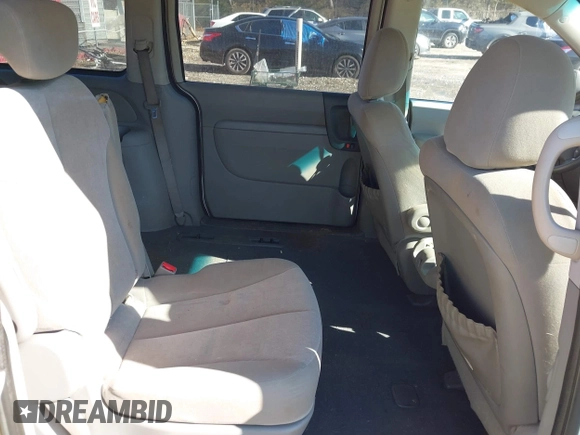 2009 Kia Sedona LX with VIN KNDMB233096312990, listed as a IAAI auction lot 41261428 with 254,323 mi miles. Bid and sale history available at carsss.com. Image 8.