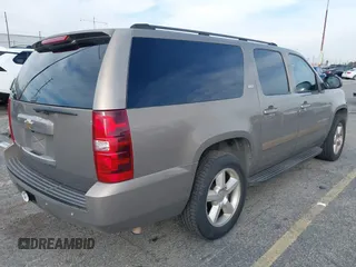 2007 Chevrolet Suburban LS with VIN 1GNFC16JX7R225286, listed as a IAAI auction lot 41594303 with 213,648 mi miles. Bid and sale history available at carsss.com. Image 4.
