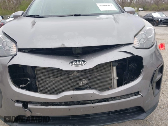 2017 Kia Sportage LX with VIN KNDPM3AC4H7231189, listed as a IAAI auction lot 42001412 with 83,550 mi miles. Bid and sale history available at carsss.com. Image 6.