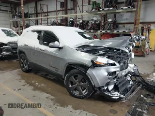 2016 Jeep Cherokee Latitude with VIN 1C4PJMCS6GW321256, listed as a IAAI auction lot 41314789 with 127,951 mi miles. Bid and sale history available at carsss.com. Image 1.