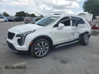 2020 Cadillac XT4 FWD Premium Luxury с VIN 1GYFZCR4XLF005029, выставлен на аукционе Copart как лот 55274025 с пробегом 50 550 миль миль и Списание • Salvage title. История ставок и продаж доступна на DreamBid. Изображение 1.