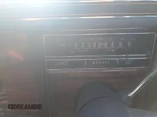 1989 Cadillac Brougham z VIN 1G6DW51Y6KR723841, wystawiony jako Copart lot #74548864 z przebiegiem 74 705 mil mil oraz Szkody całkowita. Historia ofert i sprzedaży dostępna na DreamBid. Obrazek 9.