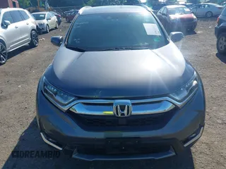 2018 Honda CR-V Touring z VIN 5J6RW2H93JL004834, wystawiony jako IAAI lot #42351364 z przebiegiem 63 746 mil mil oraz . Historia ofert i sprzedaży dostępna na DreamBid. Obrazek 12.